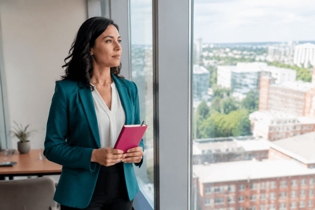 Professional woman reflecting on career identity and personal growth