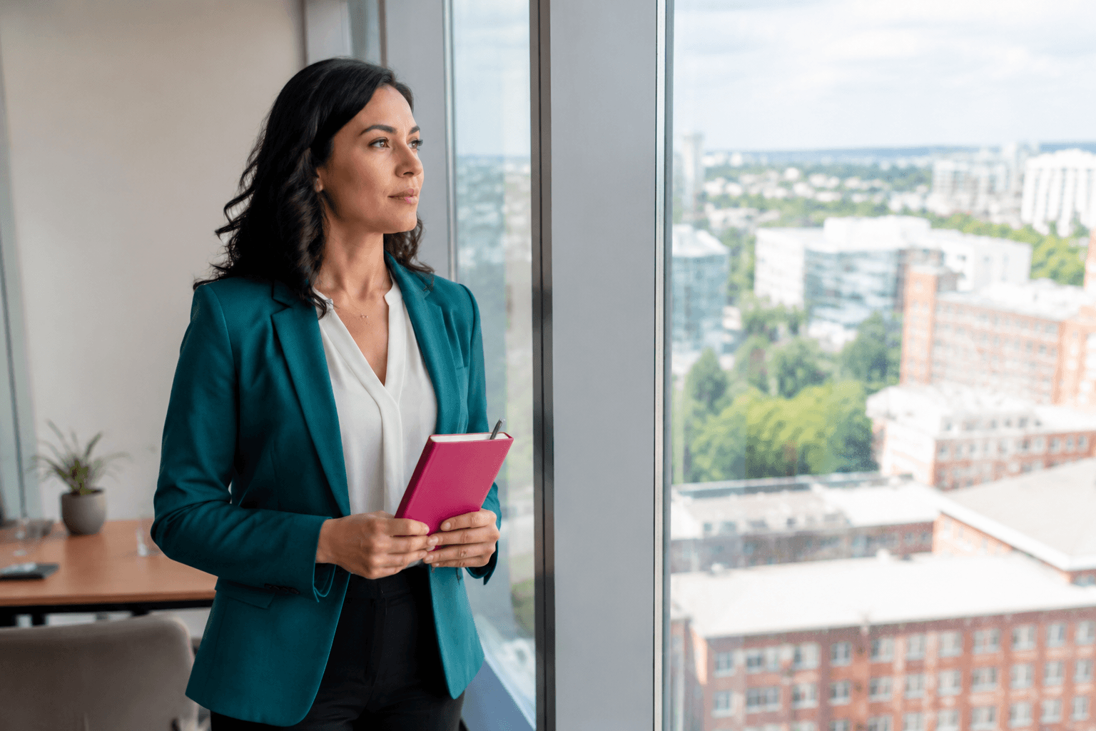 Professional woman reflecting on career identity and personal growth