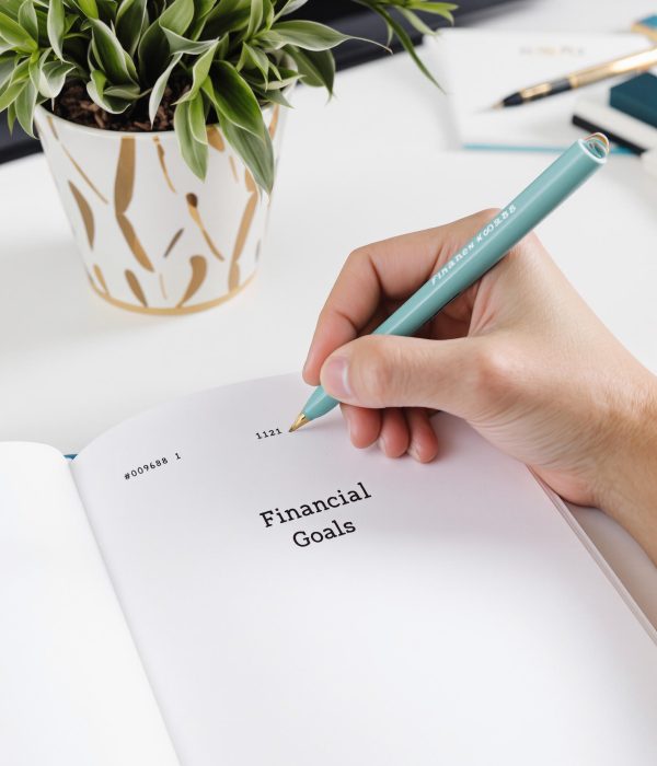 financial-anxiety-relief-services Focused journaling of financial goals as part of a financial anxiety relief process.